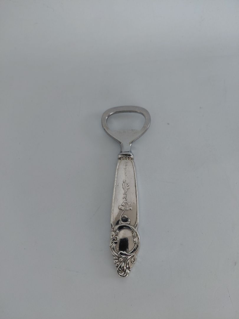 Bottle opner by Guðlaugur Magnússon (925S silver and stainless steel), Erna h/f