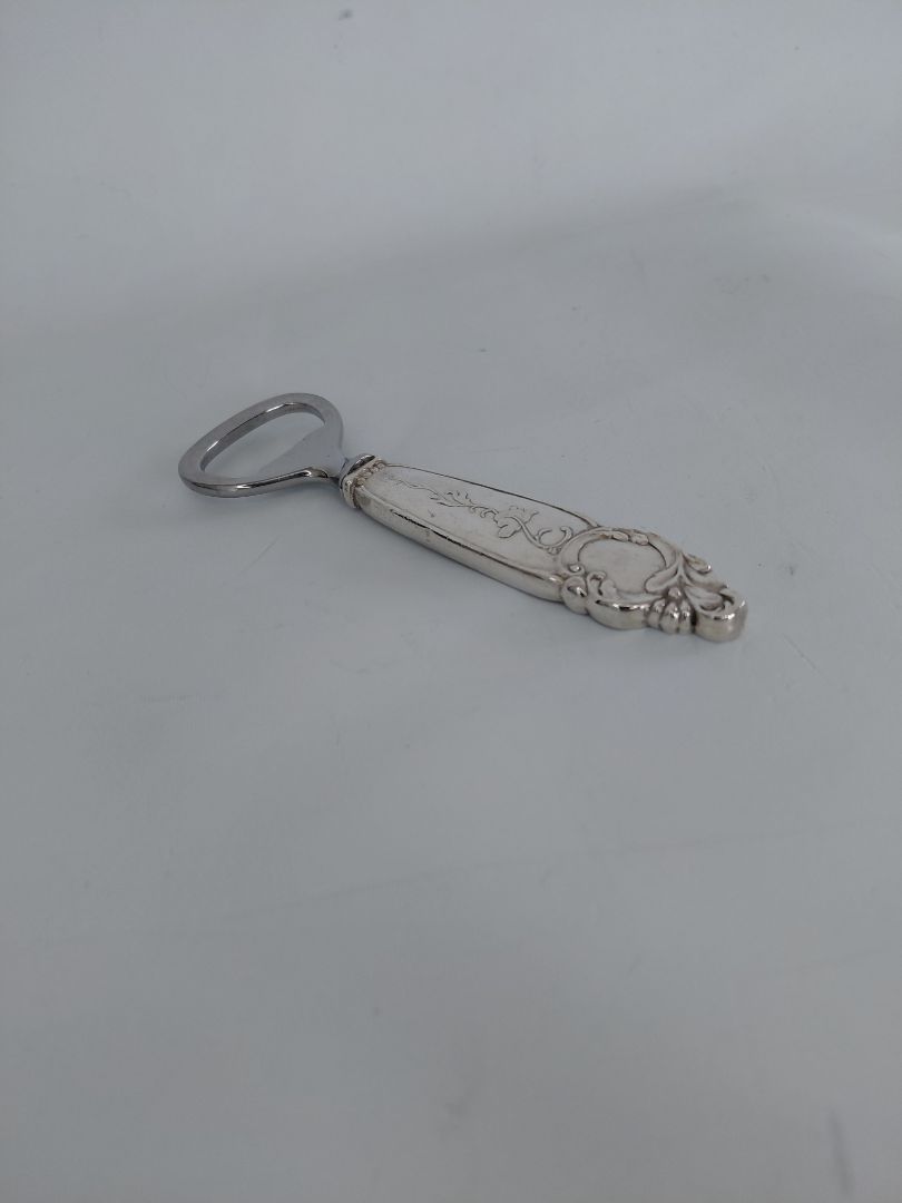Bottle opner by Guðlaugur Magnússon (925S silver and stainless steel), Erna h/f