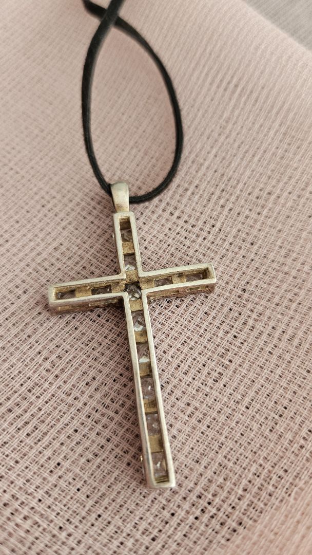 Cross with leather strap