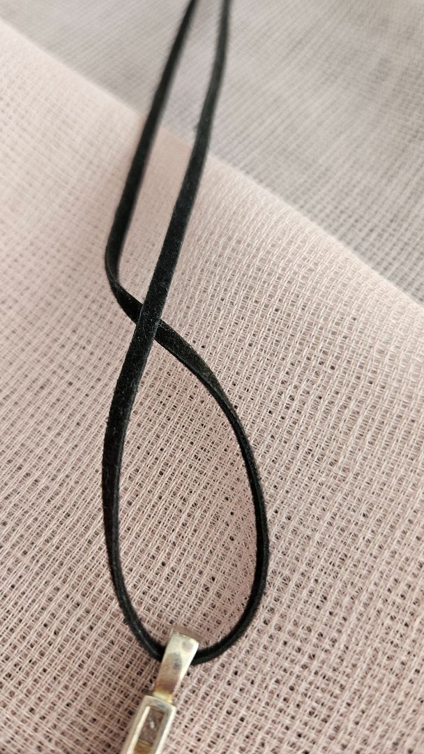 Cross with leather strap