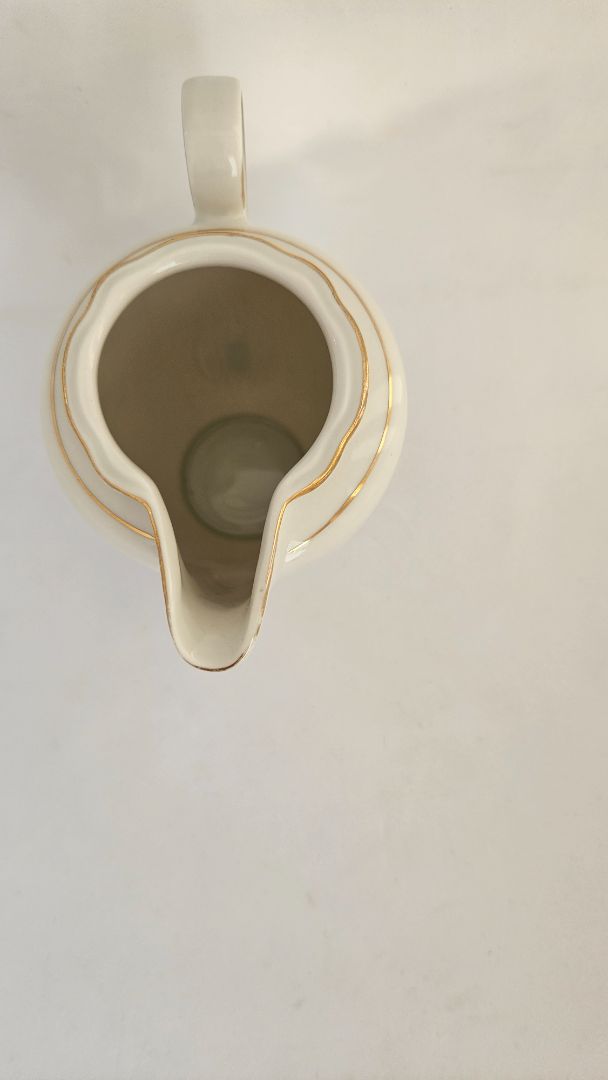 Mjólkur kanna, SÍS