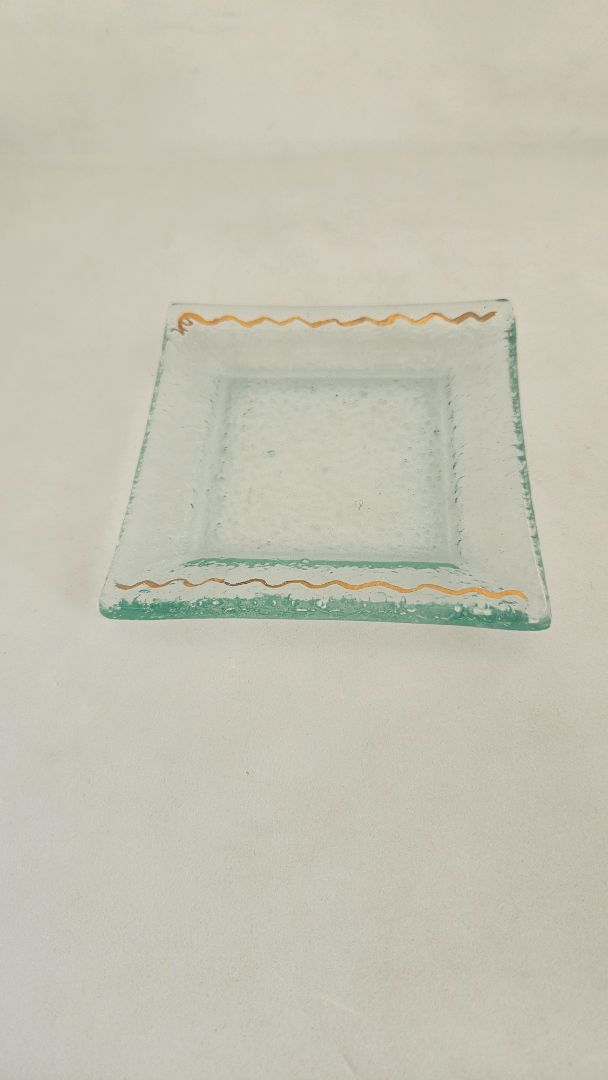 Small glass plate with gilding