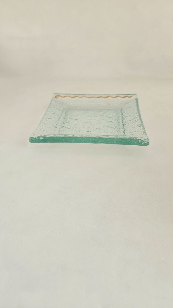 Small glass plate with gilding