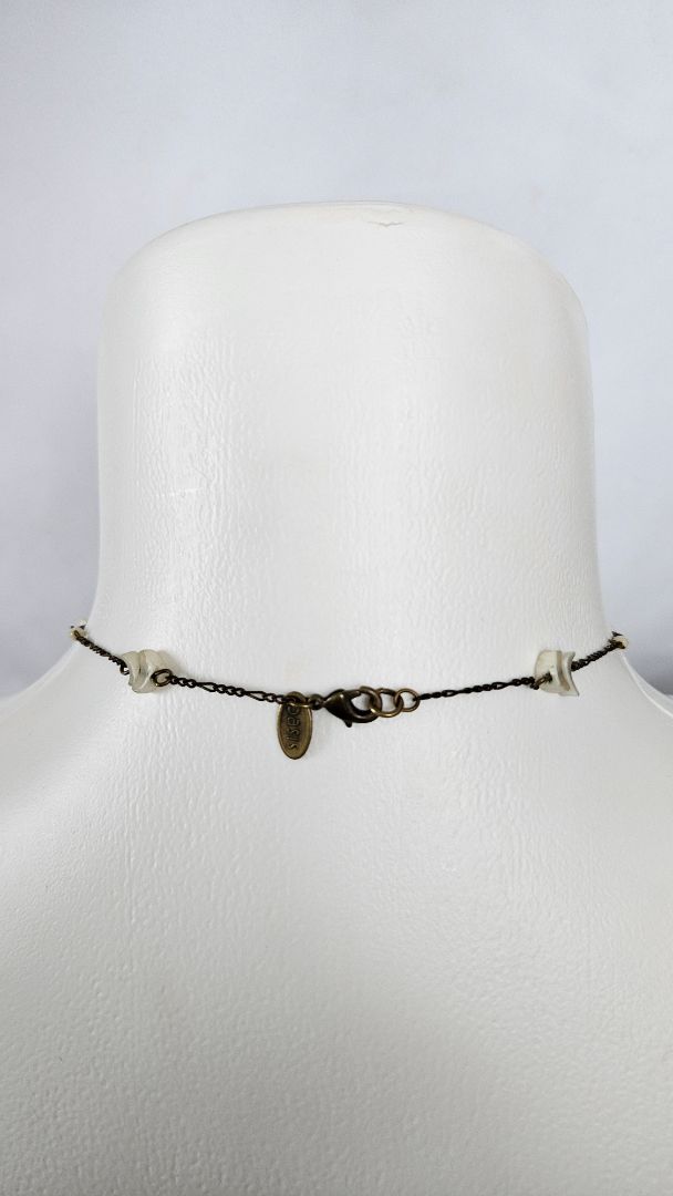 Necklace with a cross, Oasis