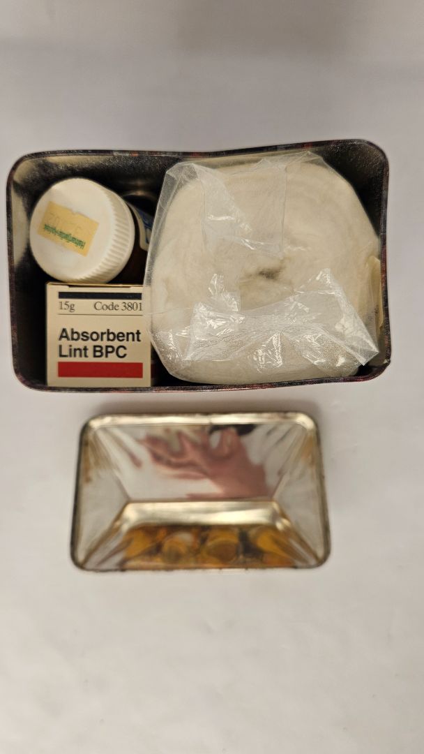 Vintage aluminum can (1990) The Drug store with first aid kit, The Silver Crane Company