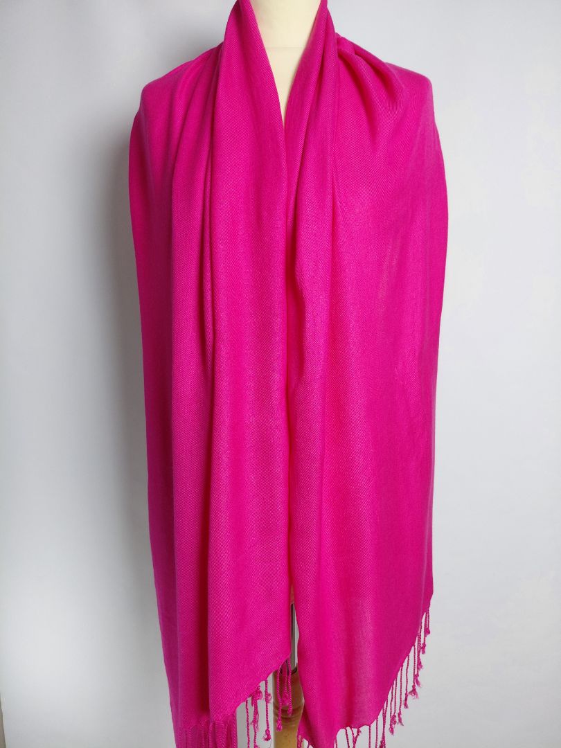 A large scarf, probably made of Pashmina wool.