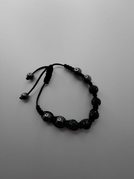 Bracelet with green sparkling stones