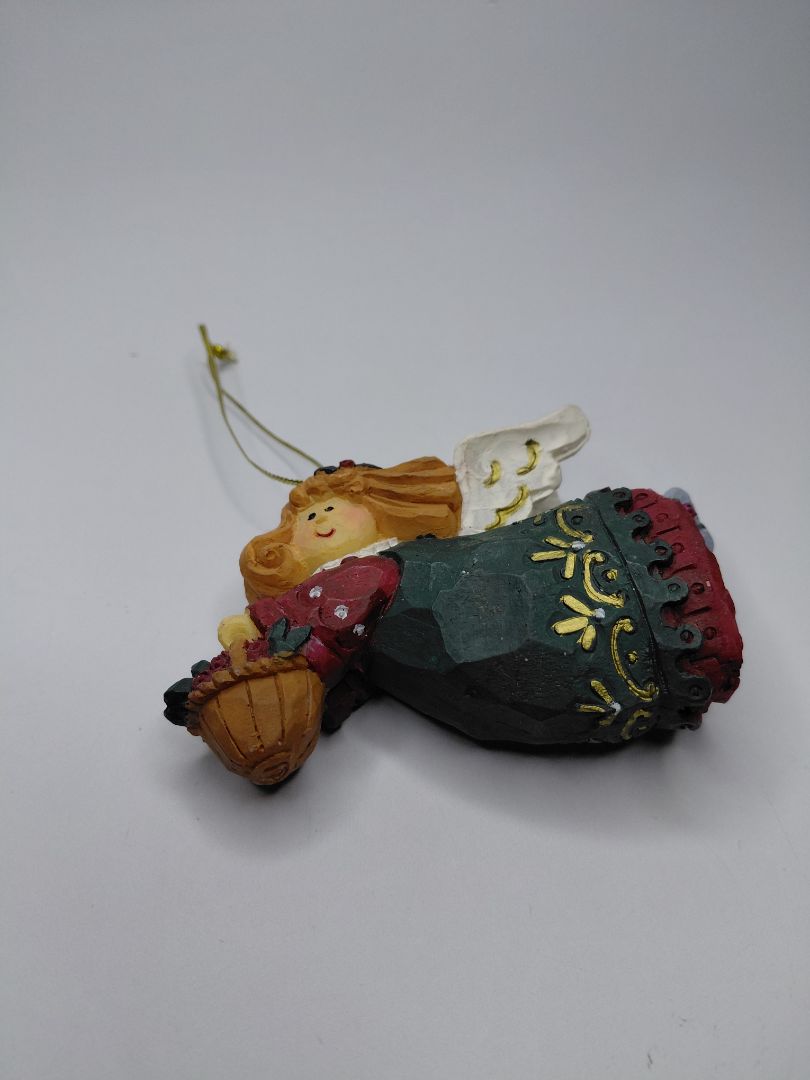 Christmas ornament - Angel holding a basket of flowers