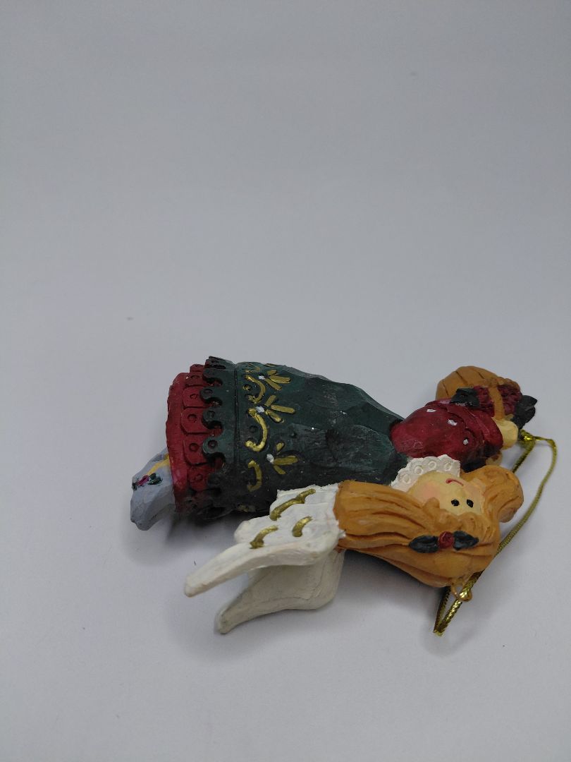 Christmas ornament - Angel holding a basket of flowers