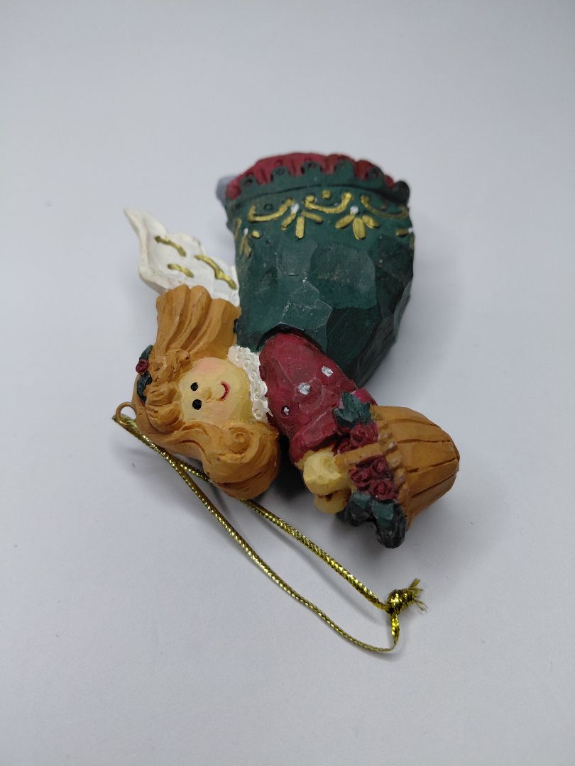 Christmas ornament - Angel holding a basket of flowers