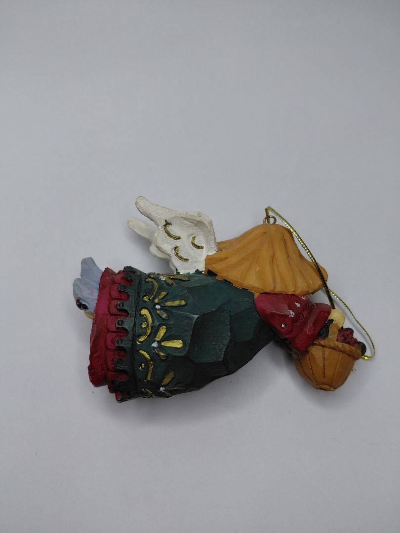 Christmas ornament - Angel holding a basket of flowers