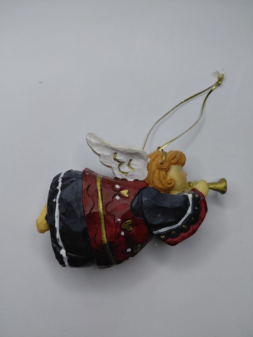 Christmas ornament - angel holding a trumpet