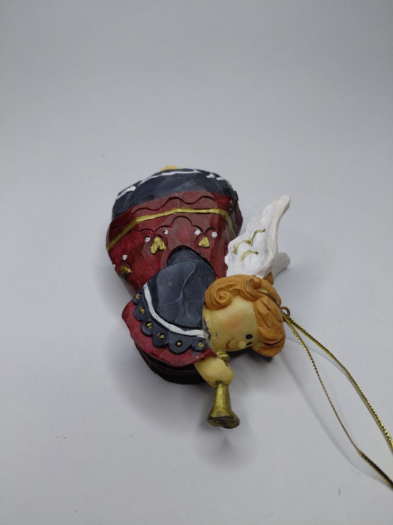 Christmas ornament - angel holding a trumpet