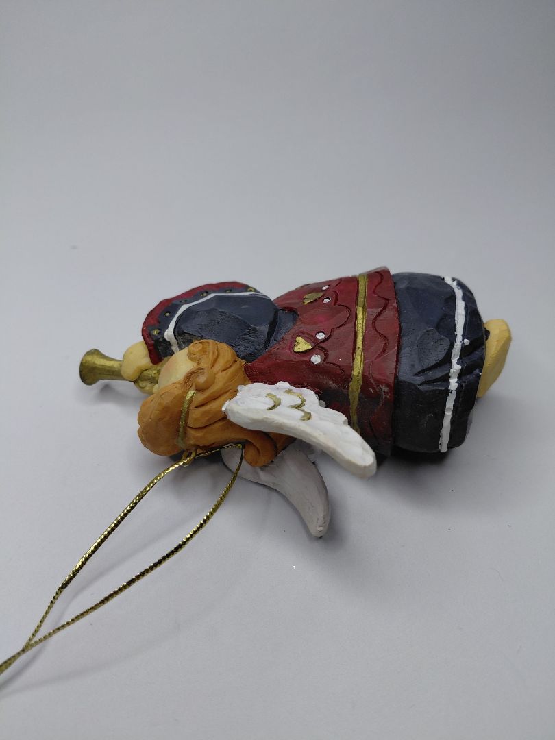 Christmas ornament - angel holding a trumpet