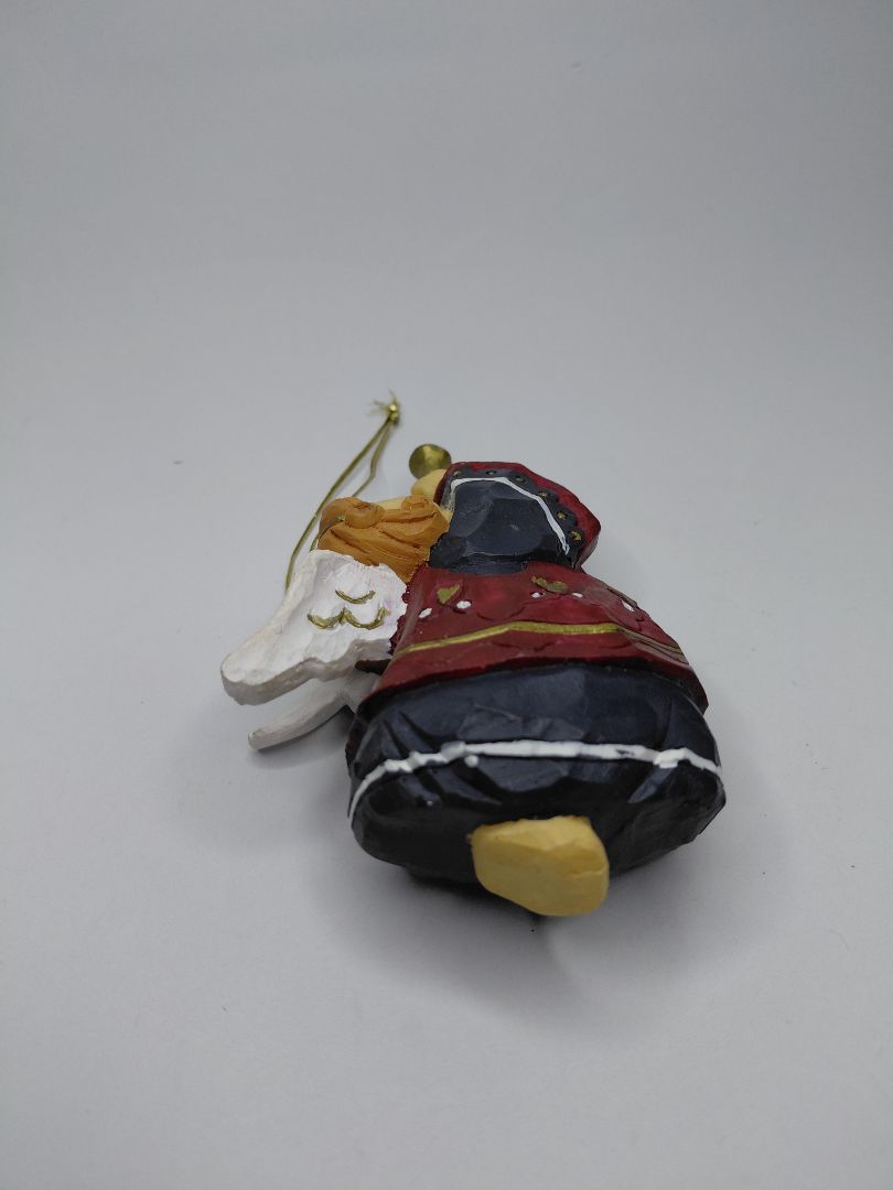 Christmas ornament - angel holding a trumpet