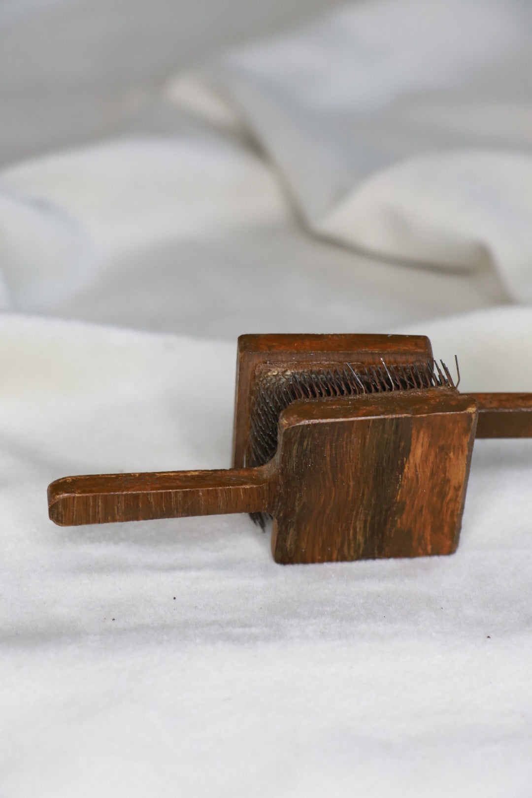 Mini ullarkambur, Antík